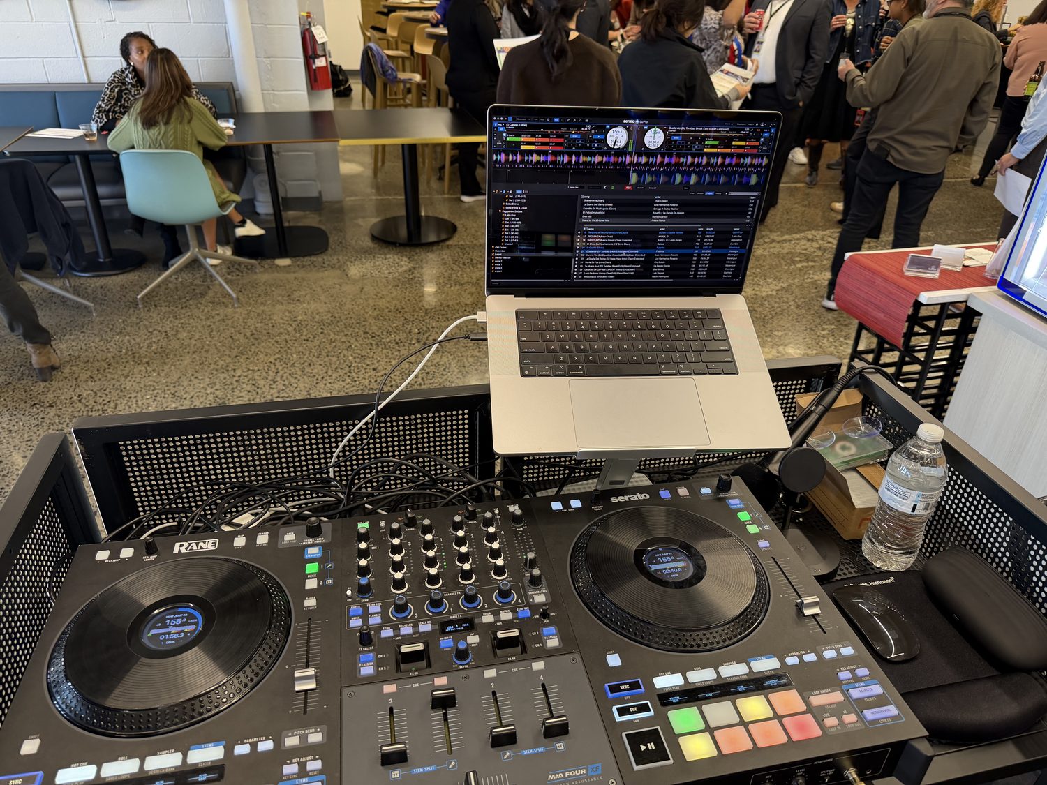 DJ setup and crowd at the L'Oréal corporate event