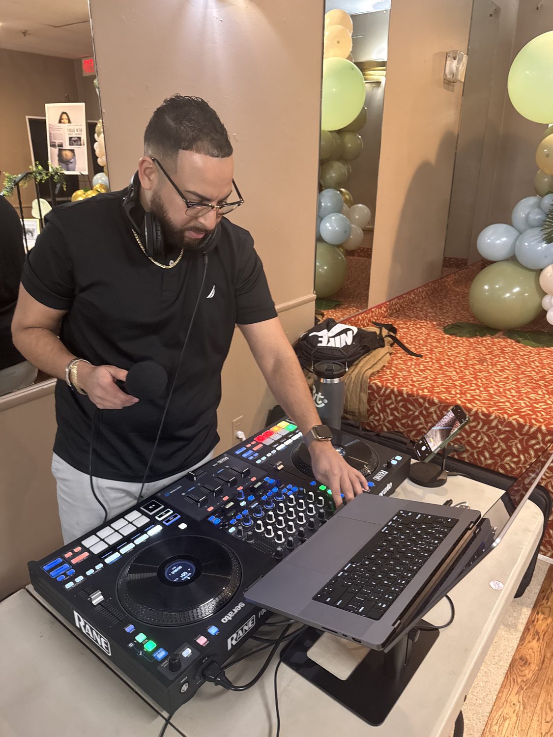 DJ LevSev on the microphone at an event